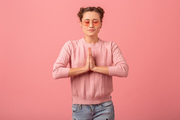 young pretty cute woman in stylish outfit in pink sweater and sunglasses