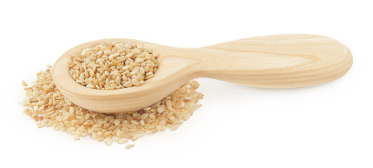 Sesame seeds in wooden spoon isolated on white background
