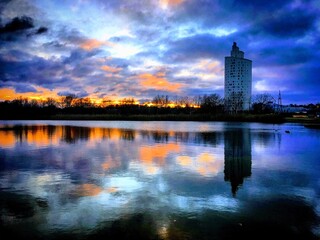 Fototapeta premium Winter sunset over the Anne lake and the city of Tartu, Estonia, December 2018