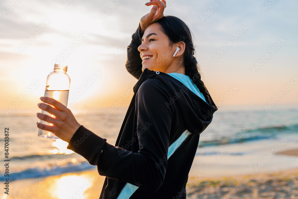 Wall mural woman doing sports in morning