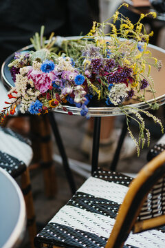 wild wedding flowers on a bistro table in Paris