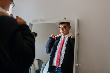 Latino getting ready for the office