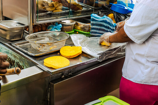 Woman Preparing Arepas