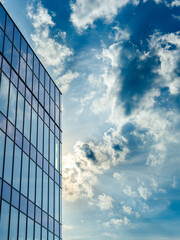 Fototapeta premium Modern glass buildings on sky