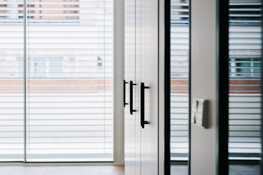 Detail of a row of cabinets in modern interior