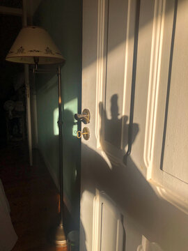 UGC POV shadow on a dor with v hand sign