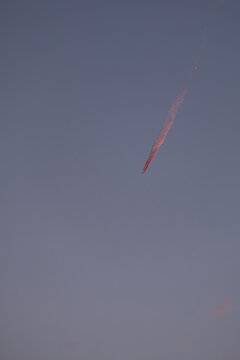 Plane in sunset lights.