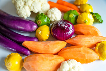 Fresh vegetables variety on a white background