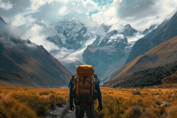 Hiker pauses, embracing the awe inspiring vista of towering, snow capped peaks during an epic mountain adventure