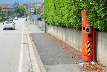 hidden speed detection device called AUTOVELOX in Italian Language captures images of speeding...