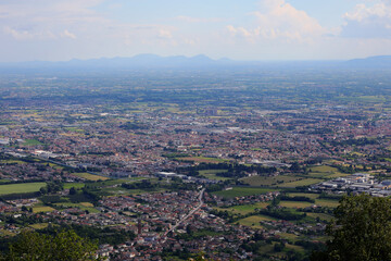 Top view of a sprawling urban landscape with houses buildings and factories