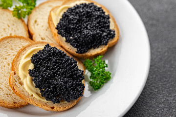 caviar lumpfish sandwich seafood black caviar fresh appetizer meal food snack on the table copy...