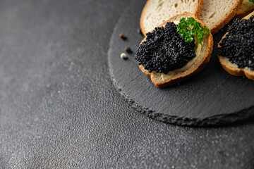 caviar lumpfish sandwich seafood black caviar fresh appetizer meal food snack on the table copy space food background rustic top view