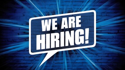 A vibrant blue background with a white speech bubble positioned centrally. Within this speech bubble, bold white and blue textreads 'WE ARE HIRING!'. The speech bubble appears to be superimposed