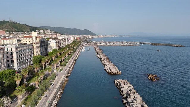Salerno, in Campania, is famous for the stunning Amalfi Coast. It offers breathtaking views of the Tyrrhenian Sea, beautiful beaches, and a lively promenade, perfect for scenic walks.