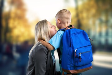 Child Schoolboy with backpack go to school