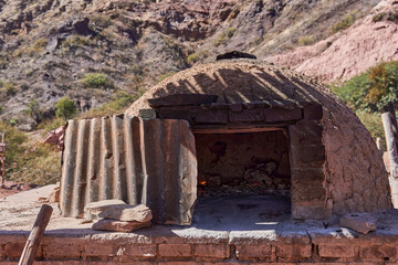 rustic clay oven in the middle of the mountains in a country house in Cafayate, Argentina