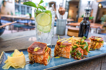 Overhead view of platter of sushi rolls