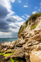 Scenic rocks under cloudy May sky near the Fishing port of Ravda, Nesebar municipality, Burgas Province, Bulgarian Black Sea coast