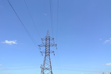 High-voltage power line against the sky.
