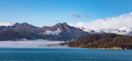 Dramatic Cloudy Morning over Alaska Coast. Nature Background