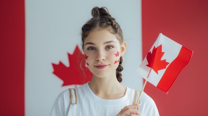 Portrait of a young woman holding a maple leaf and Canada flag, portraying patriotism on Independence Day, with an empty red and white background