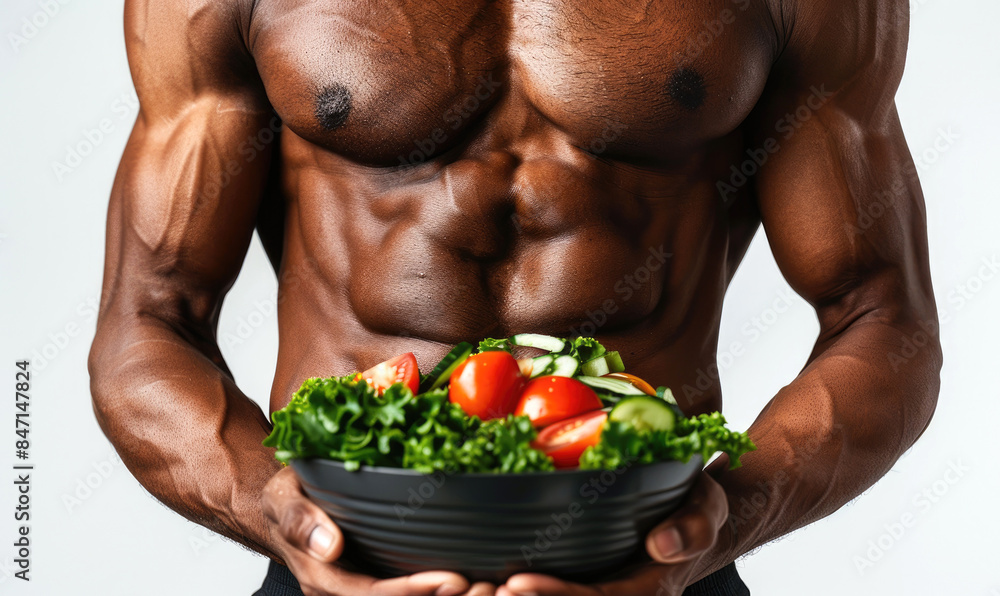 Poster A male athlete is holding a salad bowl emphasizing a healthy lifestyle