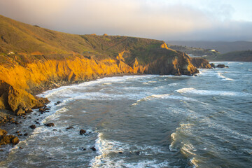 sunset in the mountains and ocean