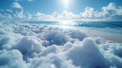 Ocean Waves Crashing on White Sandy Beach Under Sunny Skies