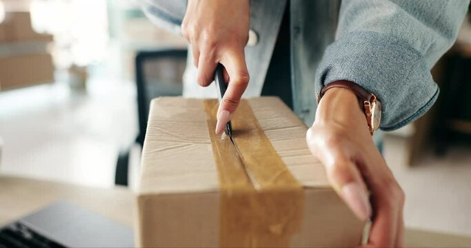 Business woman, hands and cutting box with delivery in logistics, supply chain or package at office. Female person or owner opening parcel, cargo or product for shipping or courier service at shop