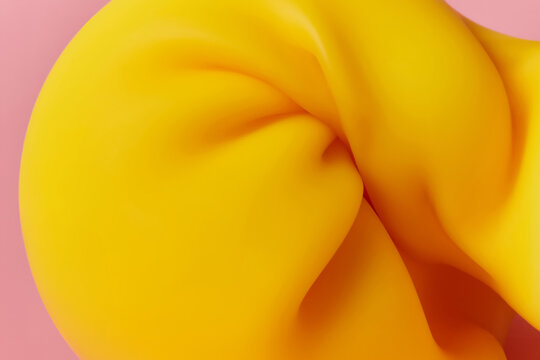 Close up of yellow plasticine with lot of bends on pink background