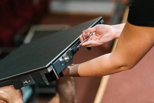 Crop technician holding an LED panel