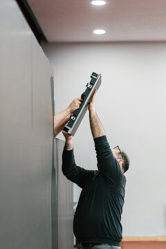 Engineers assembling the LED panel