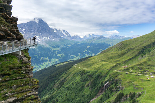 Tourist overlooking Gindelwald Alps