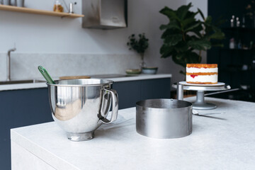 Kitchen Counter With Baking Tools and Cake