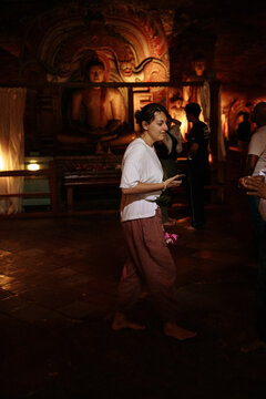 Woman inside Buddhist Temple