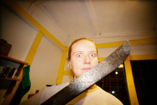 Woman holding a machete 