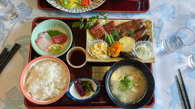 Japanese lunch with eel and raw fish