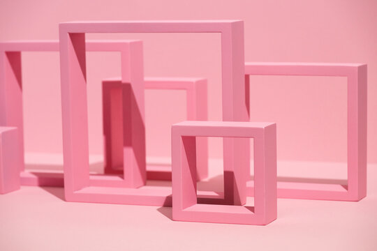 Still life of Spring tulip flowers on pink background and shapes