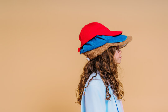  Girl with stacked caps