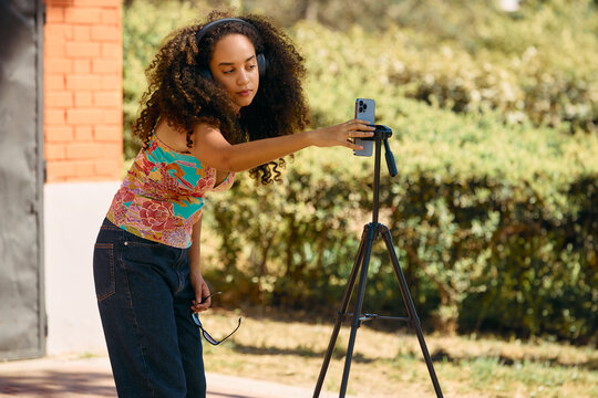 Young Content Creator Filming Videos in The Park