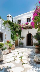 Naklejka premium a traditional Greek house featuring a vibrant bougainvillea tree in white stone and terracotta pots on the terrace, surrounded by white walls and a cobblestone floor, bathed in gentle daylight.
