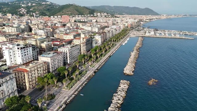 Salerno, in Campania, is famous for the stunning Amalfi Coast. It offers breathtaking views of the Tyrrhenian Sea, beautiful beaches, and a lively promenade, perfect for scenic walks.
