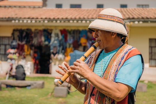 Peruvian Man playing Traditional Flute