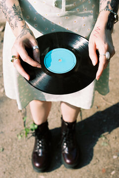 Woman holding a vinyl