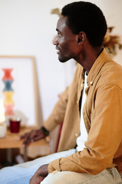 thoughtful male artist in a casual pose,