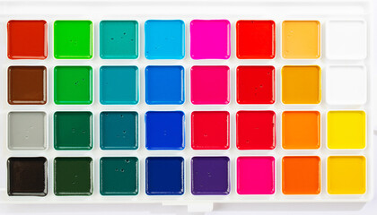 a set of watercolor paints in round bags in a white case
