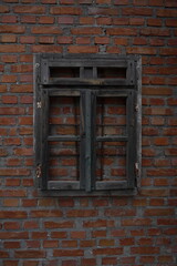old brick wall with window