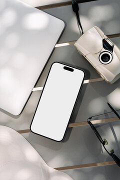 Creative Workspace. Mockup Smartphone with white screen and Camera