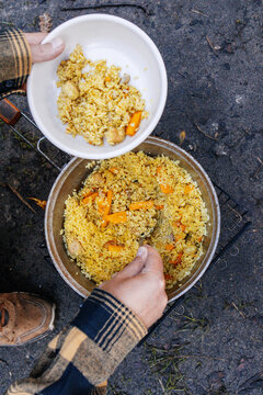 A man is making pilaf 